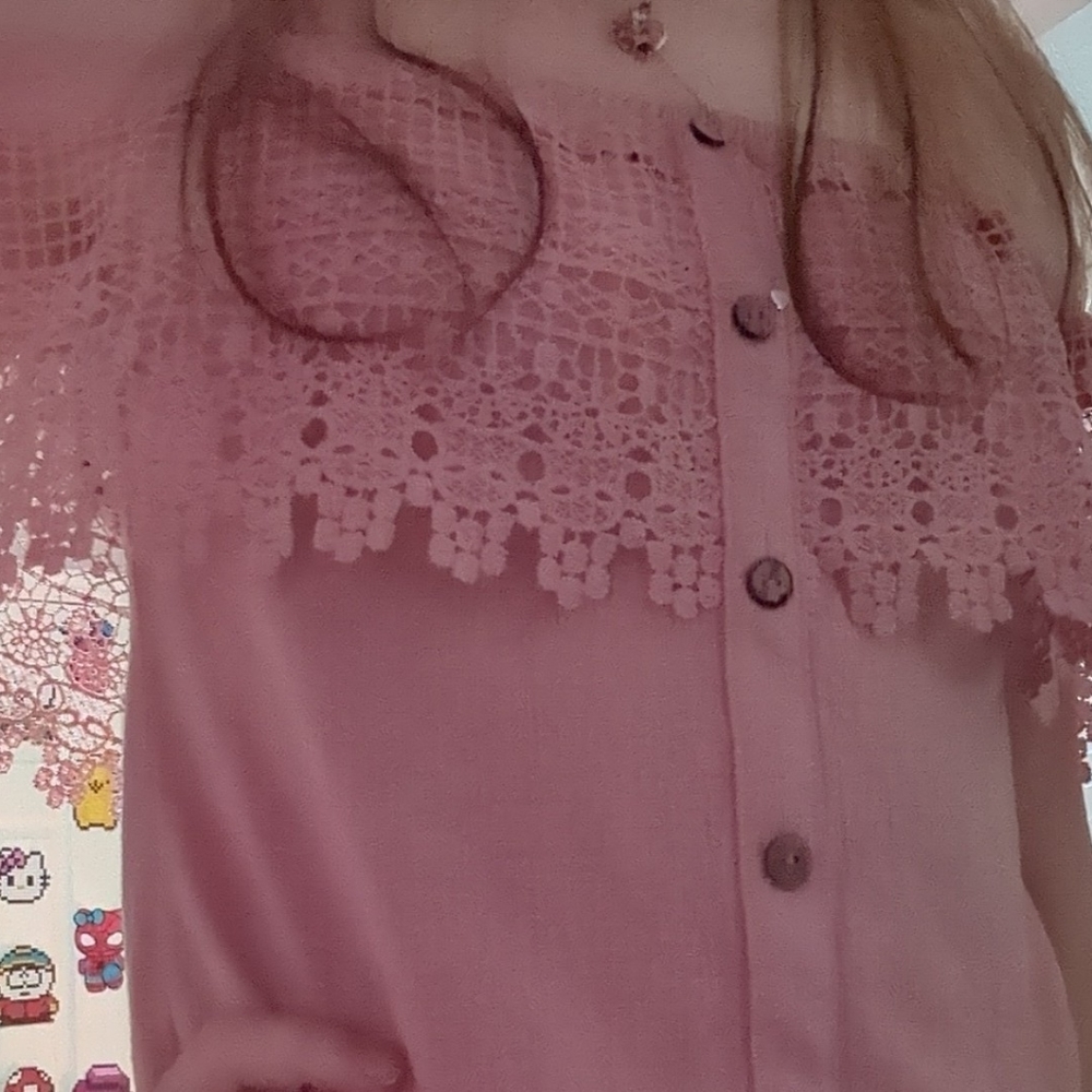 Over the shoulder pink shirt